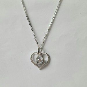 NWT Silver plated cubic zirconia heart pendant necklace.